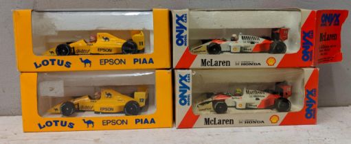 Four boxed A/F F1 model cars to include Mclaren and Lotus Location: 6.3