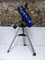 A Tasco Galaxee telescope on stand Location:
