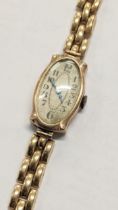 An early 20th century 9ct gold manual wind wristwatch on a gold plated bracelet Location: