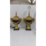 A pair of French Empire style lamps, Location: