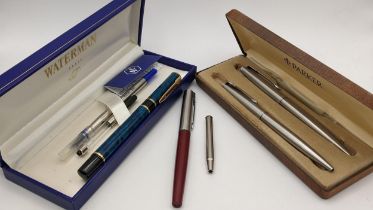 Mixed pens to include a Waterman Laureat blue fountain pen two boxed Parker ballpoint pens and two