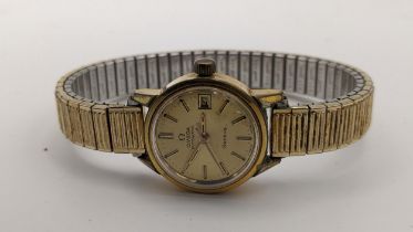 An Omega ladies Automatic gold plated wristwatch on a later expanding bracelet Location: