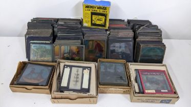 A collection of glass plate negative slides to include boxed Mickey Mouse lantern slides, Goldilocks