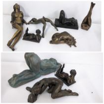 A collection of figurines of nude females including a 'Leonardo collection' figure and others