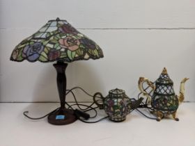 Three Tiffany style lamps to include one fashioned as a teapot and a coffee pot (please not the