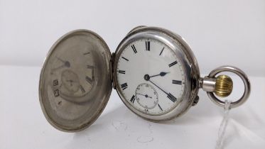An early 20th century silver full Hunter pocket watch, engraved with initials, hallmarked Birmingham