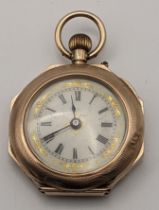 An early 20th century gold keyless wound ladies fob watch in an engine turned octagonal case, London