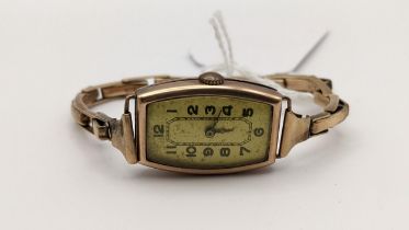 A 1930s 9ct gold manual wind gents wristwatch on a 9ct gold expanding bracelet 15.6g Location: