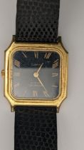 A Raymond Weil gents quartz gold plated wristwatch on a black leather strap Location: