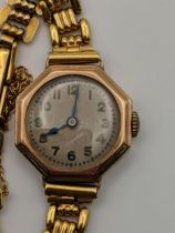 A 9ct gold ladies wristwatch on a flexible strap, 13.45g excluding the movement Location: