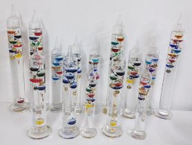 A collection of floating glass Galileo thermometers Location: