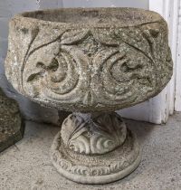 A reconstituted stoneware garden planter having a bulbous column and circular base, 47h x 44w,