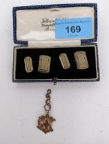 A Victorian gold coloured fob on 9ct gold chain A/F, Fob unmarked 3.15g, along with a pair of silver