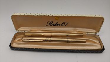 Two Parker fountain pens to include one with 14ct gold nib, in a Parker 61 box A/F Location: