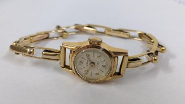 A vintage Plaza ladies 9ct gold wristwatch on a 9ct gold expanding bracelet, 8.8g, Location: