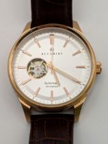 An Accurist automatic gents stainless steel wristwatch with a silver coloured face with rose gold