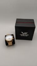 A Vostok Europe Dualtime 12/24 hour, automatic, stainless steel gents wristwatch with a white