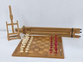 A mixed lot to include a wooden chessboard, 50cm x 50cm, together with bone carved chess pieces,