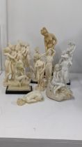 A group of nude classical ladies to include a nude lady resting on a rock and others, one A/F,
