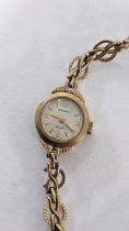 A vintage Rotary ladies 9ct gold manual wind wristwatch on a 9ct gold bracelet 11g Location: