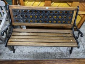 An iron and wooden slatted garden bench, 79.5 x 127 x 62, Location: