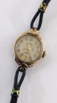 A vintage Rotary ladies 9ct gold manual wind wristwatch on a black leather strap Location: