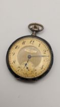 An Audemars Freres open faced pocket watch having a gilt engine turned dial, Niello decorated silver