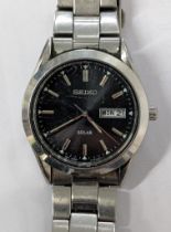 A Seiko gents day/date stainless steel wristwatch, Location: