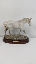 A Royal Doulton model of a horse entitled Desert Orchid No. 297 Location: