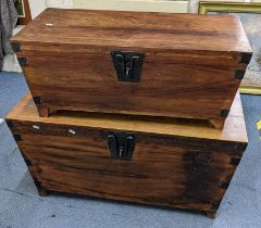 Two teak blanket chests having wrought iron supports and twin carrying handles, 45.5cm h x 96.5cm w,