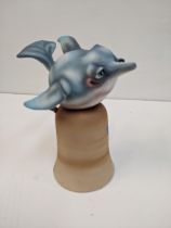 Todd Warner ceramic dinner bell fashioned as a fish Location: