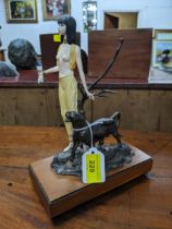 An Khartoum Albany limited edition bronze and porcelain figurine mounted on a wooden base Location: