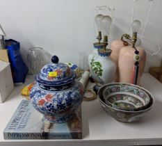 A mixed lot to include four table lamps, two oriental style bowls an Impressionism book, a vase