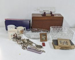 A mixed lot to include a silver and silver plated teaspoons, a masonic lighter, a crystal cut