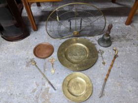 Mixed metal ware to include a 19th century brass and wire peacock hook on fire guard, a military