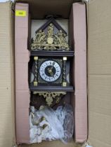 A 20th century wooden cased and brass Dutch wall clock with three weights Location: