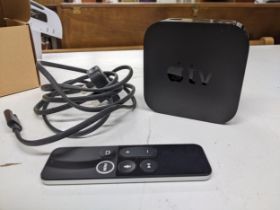 An Apple TV model A1842, 100-240v, with remote, and plug lead Location: