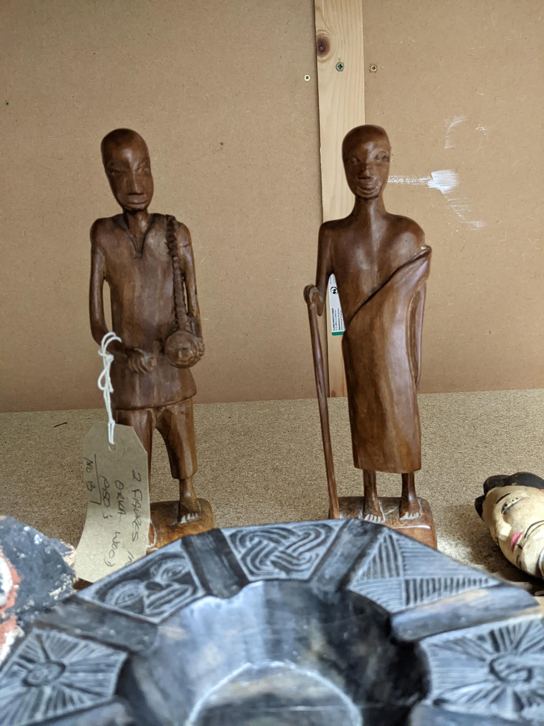 A group of African tribal art carved wooden figures and a bowl to include a painted light wood - Image 4 of 5