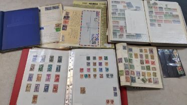 A selection of stamps and first day covers from around the world, mounted in albums Location: 1:5