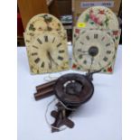 Three 19th century Black Forest wall clock movements, one made entirely of wood, with a twin