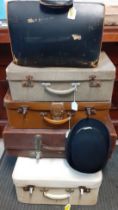 A mixed lot to include four 1920's-1960's suitcases together with a late 20th Century black