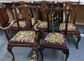 A set of five circa 1900 Chippendale style mahogany pierced splat back dining chairs, on cabriole
