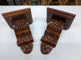Early 20th carved wooden mahogany, wall brackets Location:
