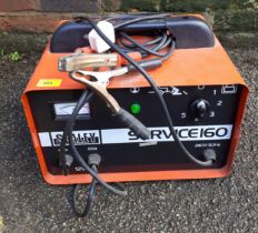A red Sealey Service 60, 12volt jump box with leads. Location:G
