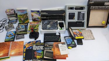 Vintage games console/computers to include two ZX Spectrums, an Expansion system, games, joy stick