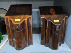 Two Georgian inlaid mahogany knife boxes, each with an oval shell medallion inlaid to the lid each