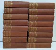 A collection of late 19th century red bound Charles Dickens books Location: