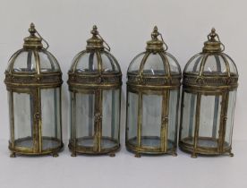 A set of four brass finish classical style hexagonal dome lanterns on four claw feet Location: