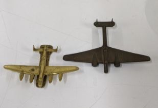 A solid brass airplane door knocker, along with a WW2 brass model airplane Location: