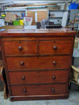 A Victorian mahogany chest of two short and three long drawers on bun feet 116cm x 102.5cm x 50.